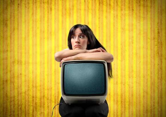 Bored Woman with Old TV Bored Woman with Old TV (Smart Ways to Breathe New Life into Your Living Room without Breaking the Bank)