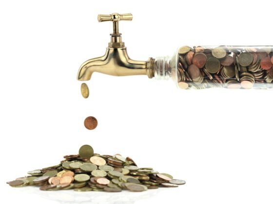 Featured image - How to Lower Your Water Bill - The Top Tips for Saving Money