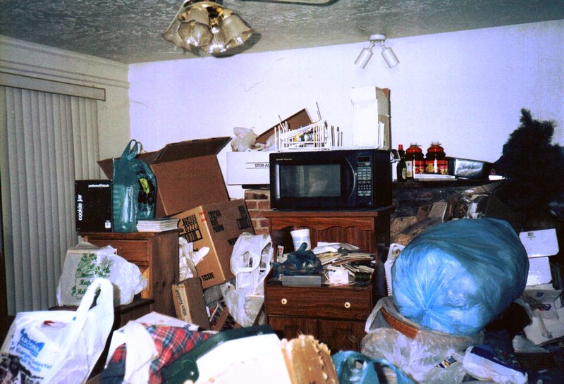 Featured image - Drowning in Your Own Clutter - 8 Signs & Symptoms of Hoarding