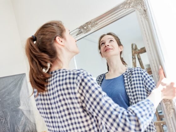 Featured image - How Much Does a Mirror Wall Cost for Your Home Decor