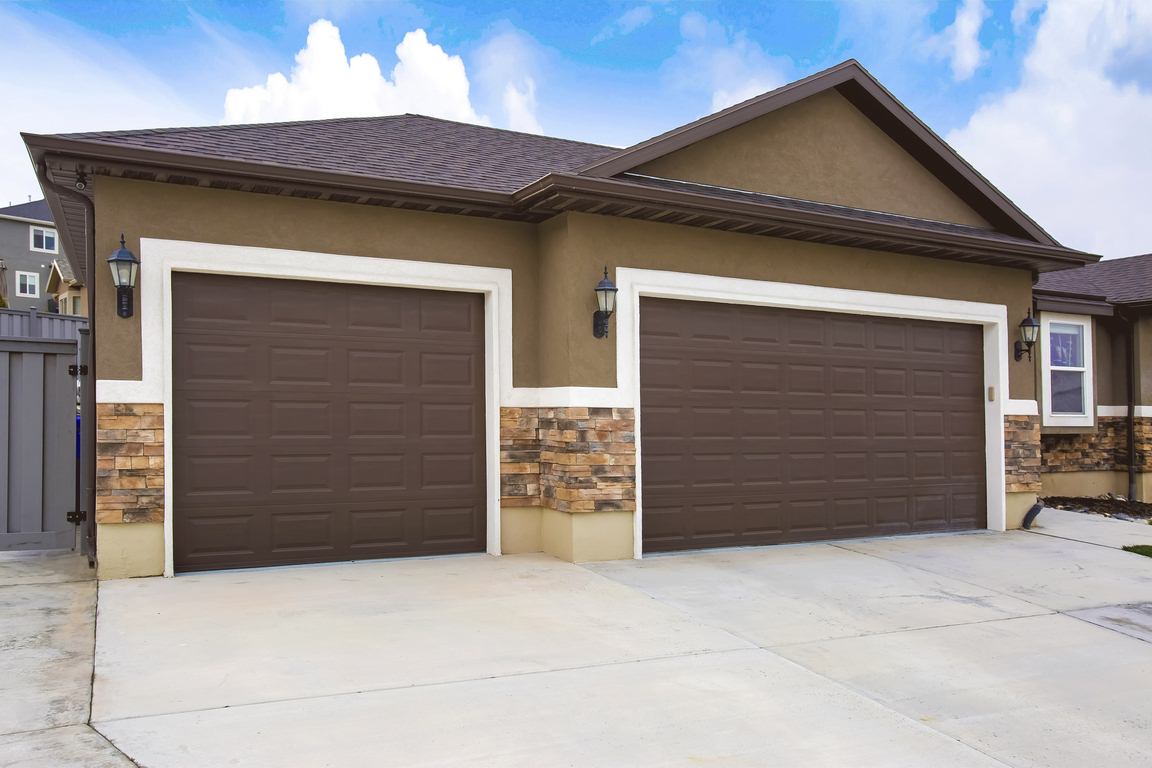 Featured image - 9 Summer Maintenance Tips for Your Garage Door