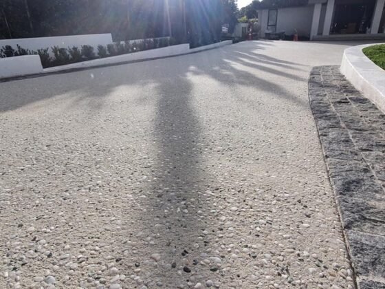 Featured image - How Much Does It Cost to Pour a Concrete Driveway