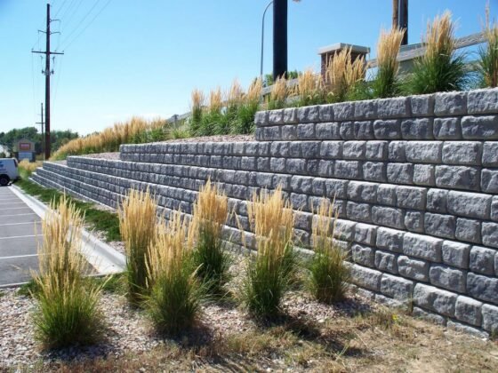 Featured image - The 4 Benefits to Adding a Retaining Wall to Your Landscape