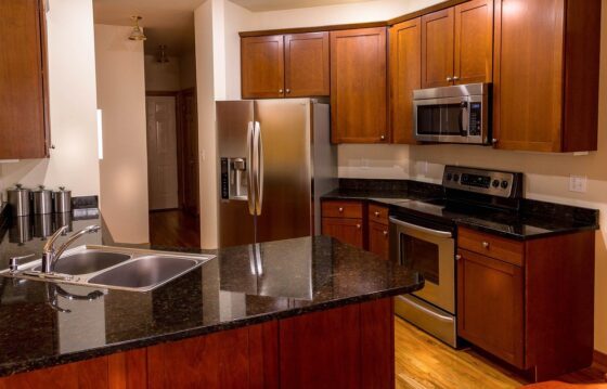 featured image - Just Like New 3 Tips for Repainting Kitchen Cabinets