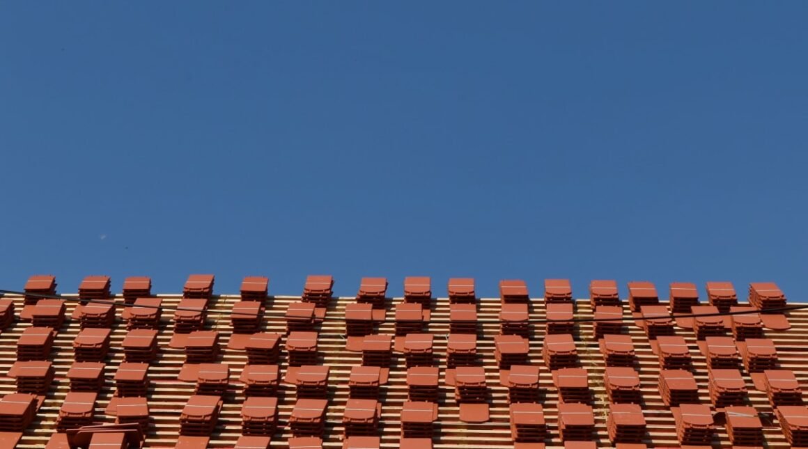 featured image - Should You Restore or Replace the Roof