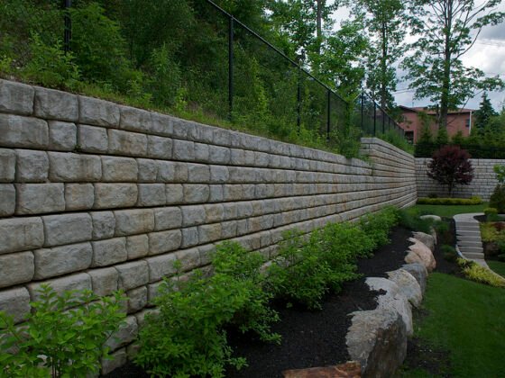 featured image - Benefits of Hiring a Retaining Wall Contractor