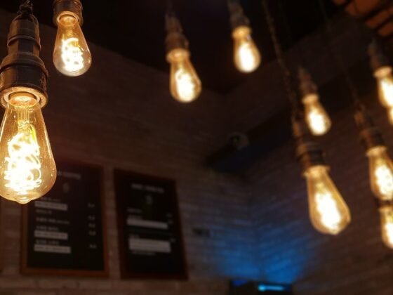 featured image - The Great Bedroom Debate Modern Ceiling Fans vs. Light Fixtures