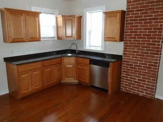 featured image - How to Protect Hardwood Floors in Kitchen