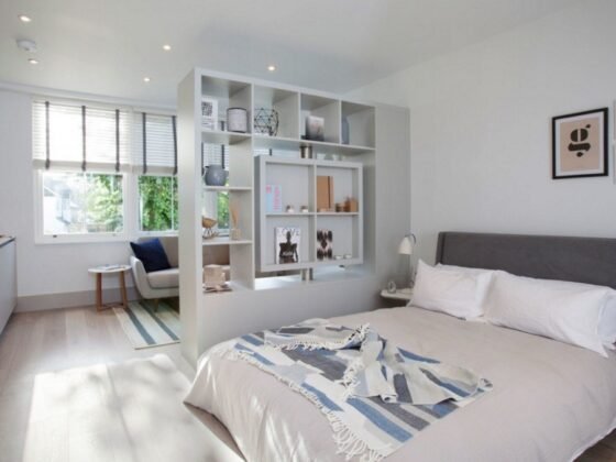 featured image - How to Save Space in a Studio Apartment