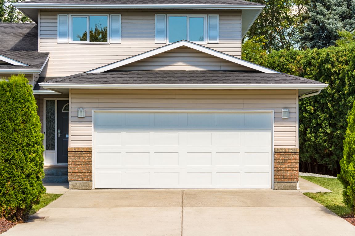 featured image - 4 Ideas to Spruce Up Your Garage Door