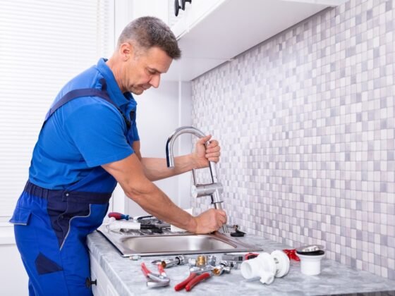 featured image - Why Plumbers are Essential in Kitchen Redesign