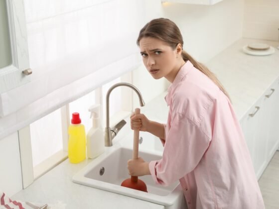 featured image - 7 Ways A Clogged Drain Can Damage Your Home