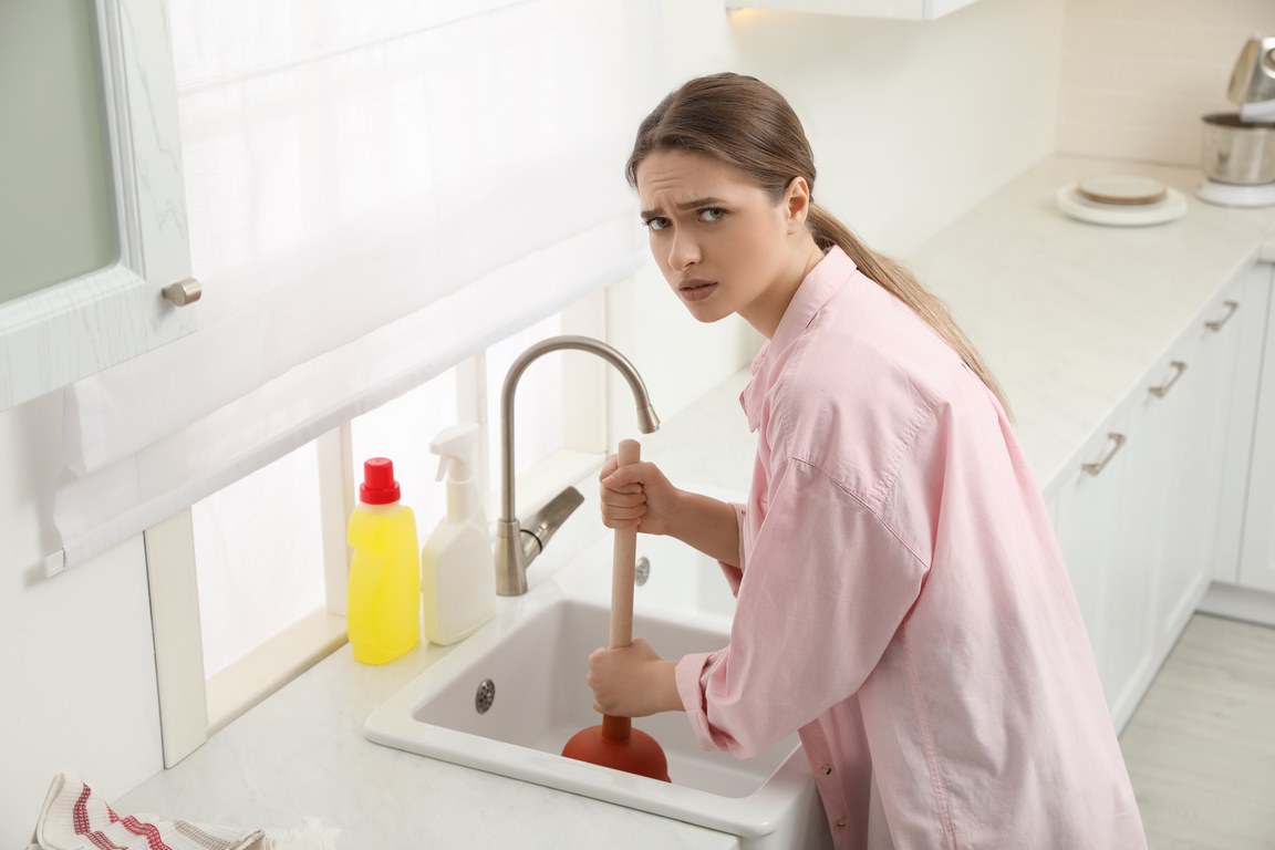 featured image - 7 Ways A Clogged Drain Can Damage Your Home