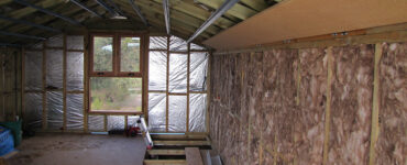featured image - How Thick Should the Insulation Be in An Attic