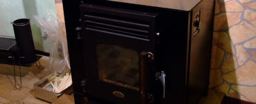 featured image - Pellet Stove vs Wood Stove Which Is Better
