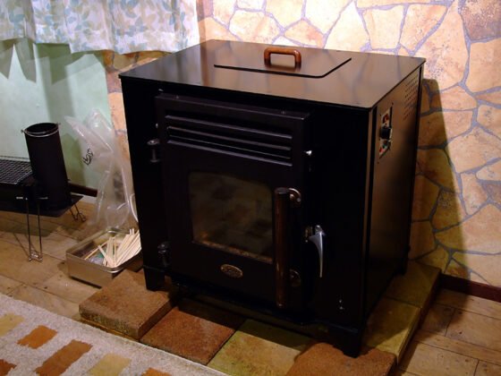 featured image - Pellet Stove vs Wood Stove Which Is Better