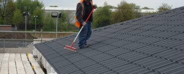 featured image - Benefits of Hiring a Professional Roof Cleaning Company
