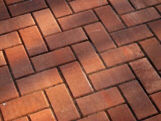 featured image - Yes, You Need to Seal Your Pavers. Here's Why!
