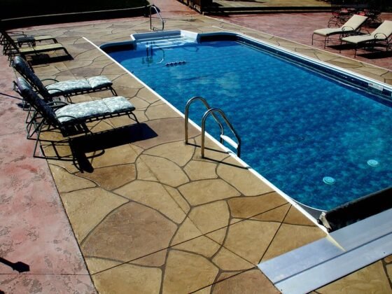 featured image - The Ultimate Guide to Upgrading Your Pool Area