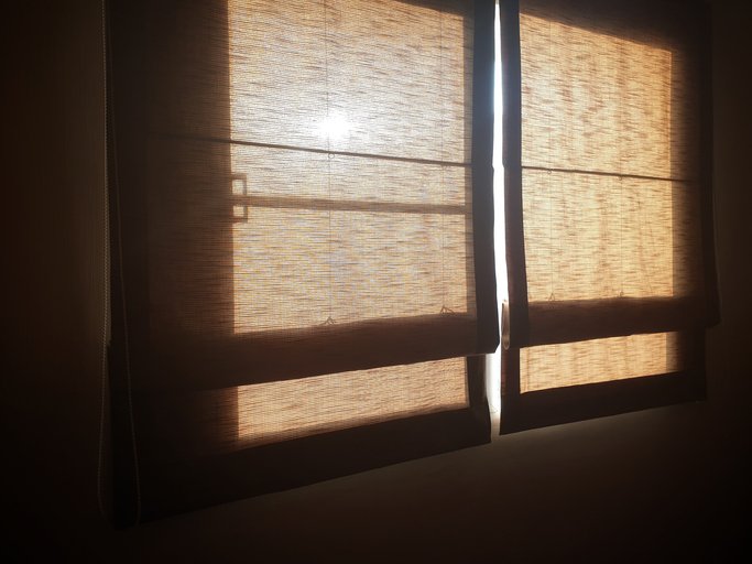 featured image - Timeless Elegance Redefined: The Allure of Roman Blinds in Canadian Homes