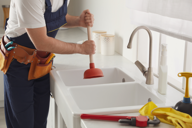 featured image - Professional Vs. Diy: When to Call the Experts for Your Clogged Drain