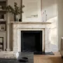 Antique marble mantelpiece in a contemporary living room