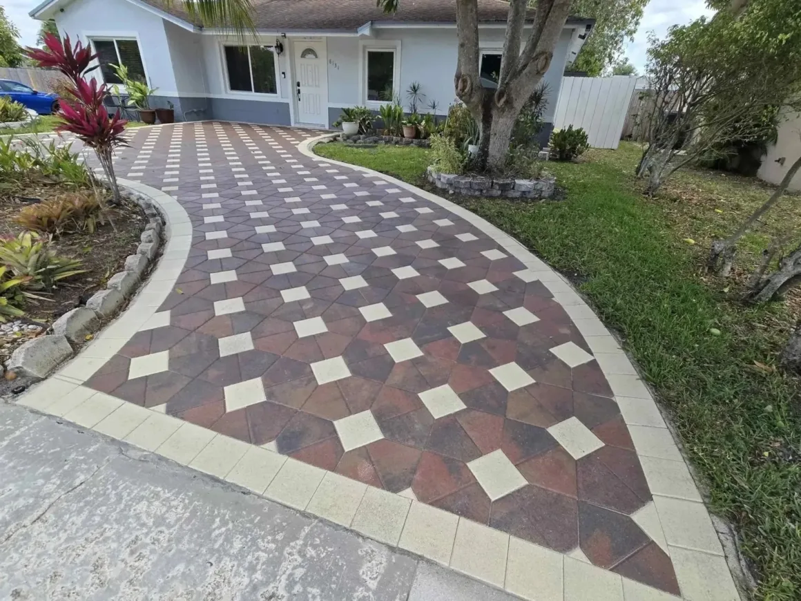 Decorative residential paver driveway with contrasting border