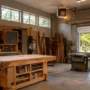 An organized modern workshop with a high ceiling unit heater mounted near the ceiling