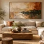 A prominent, well-proportioned abstract painting hung above a sofa in a sunlit modern living room with lots of negative space.