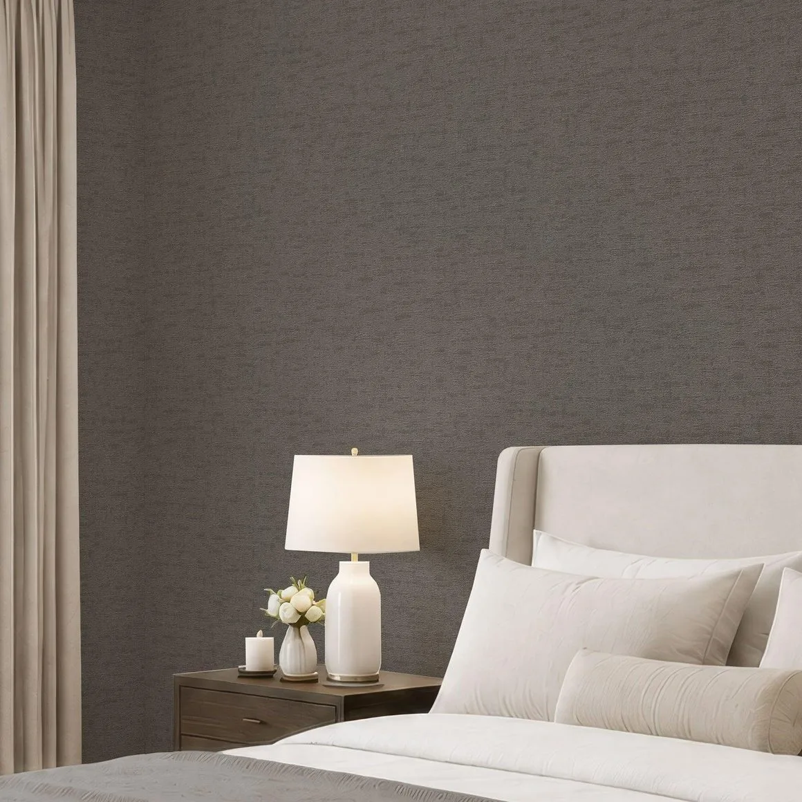 Warm beige limewash wall paired with natural wood and linen furniture