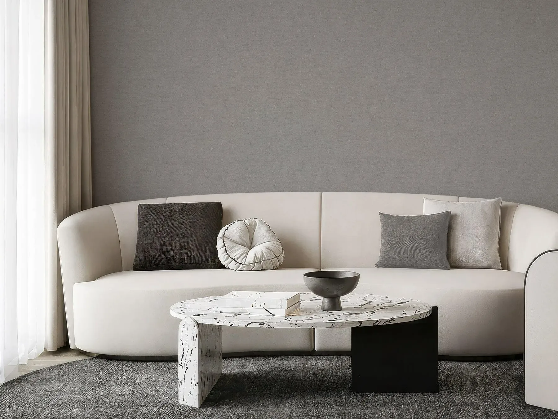 Minimalist living room showcasing a beige limewash-inspired wall texture